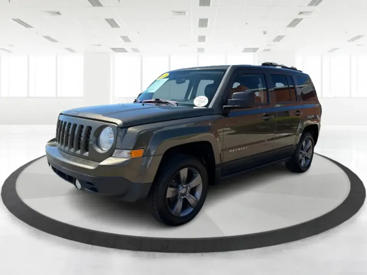 2015 Jeep Patriot Latitude 4WD (1C4NJRFB3FD) with an 2.4L L4 DOHC 16V engine, located at 8750 N County Rd 25A, Piqua, OH, 45356, (937) 908-9800, 40.164391, -84.232513 - When your weekends bounce between soccer fields, grocery runs, and quick getaways to the outdoors, you need an SUV that can handle everyday life without feeling like a chore. This 2015 Jeep Patriot Latitude 4WD is a practical, adventure-ready choice for Piqua-area drivers who want confident traction- Photo#8