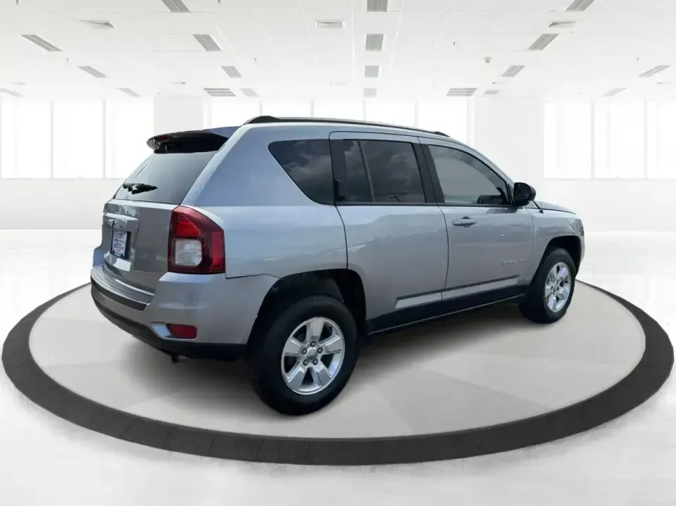 2015 Jeep Compass Sport FWD (1C4NJCBA6FD) with an 2.0L L4 DOHC 16V engine, located at 880 E. National Road, Vandalia, OH, 45377, (937) 908-9800, 39.891918, -84.183594 - Weekday commutes down I75, school drop-offs in Butler Township, and quick weekend getaways to the National Museum of the U.S. Air Force or Taylorsville MetroPark all call for an SUV that's easy to live with, comfortable for five, and efficient enough to keep your budget in check. This **2015 Jeep Co - Photo#2