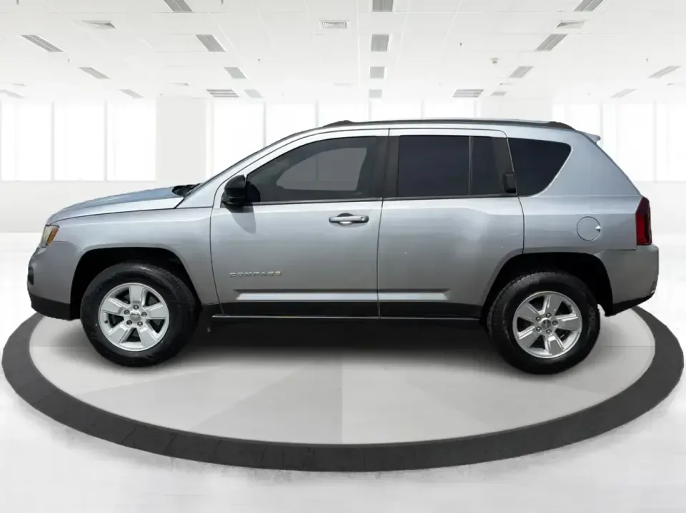 2015 Jeep Compass Sport FWD (1C4NJCBA6FD) with an 2.0L L4 DOHC 16V engine, located at 880 E. National Road, Vandalia, OH, 45377, (937) 908-9800, 39.891918, -84.183594 - Weekday commutes down I75, school drop-offs in Butler Township, and quick weekend getaways to the National Museum of the U.S. Air Force or Taylorsville MetroPark all call for an SUV that's easy to live with, comfortable for five, and efficient enough to keep your budget in check. This **2015 Jeep Co - Photo#5