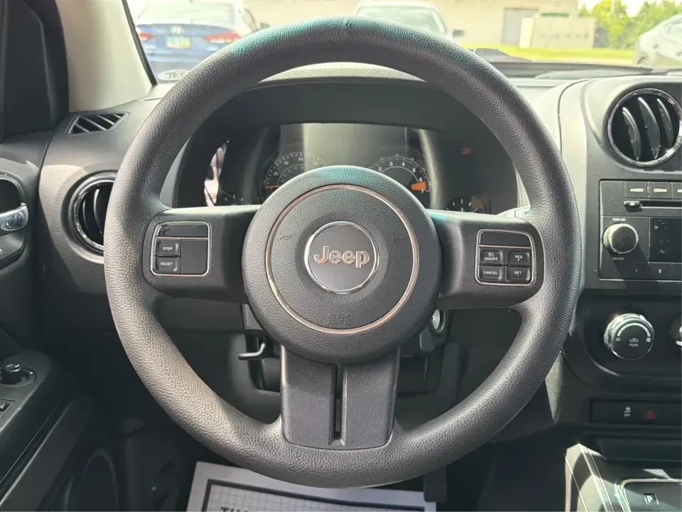 2015 Jeep Compass Sport FWD (1C4NJCBA6FD) with an 2.0L L4 DOHC 16V engine, located at 880 E. National Road, Vandalia, OH, 45377, (937) 908-9800, 39.891918, -84.183594 - Weekday commutes down I75, school drop-offs in Butler Township, and quick weekend getaways to the National Museum of the U.S. Air Force or Taylorsville MetroPark all call for an SUV that's easy to live with, comfortable for five, and efficient enough to keep your budget in check. This **2015 Jeep Co - Photo#16