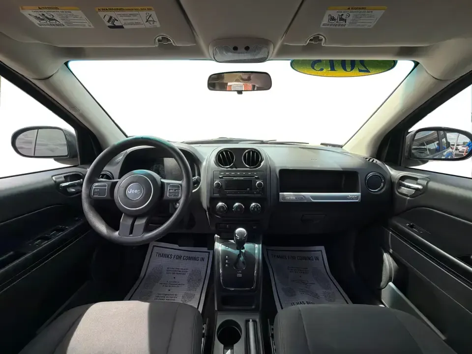2015 Jeep Compass Sport FWD (1C4NJCBA6FD) with an 2.0L L4 DOHC 16V engine, located at 880 E. National Road, Vandalia, OH, 45377, (937) 908-9800, 39.891918, -84.183594 - Weekday commutes down I75, school drop-offs in Butler Township, and quick weekend getaways to the National Museum of the U.S. Air Force or Taylorsville MetroPark all call for an SUV that's easy to live with, comfortable for five, and efficient enough to keep your budget in check. This **2015 Jeep Co - Photo#19