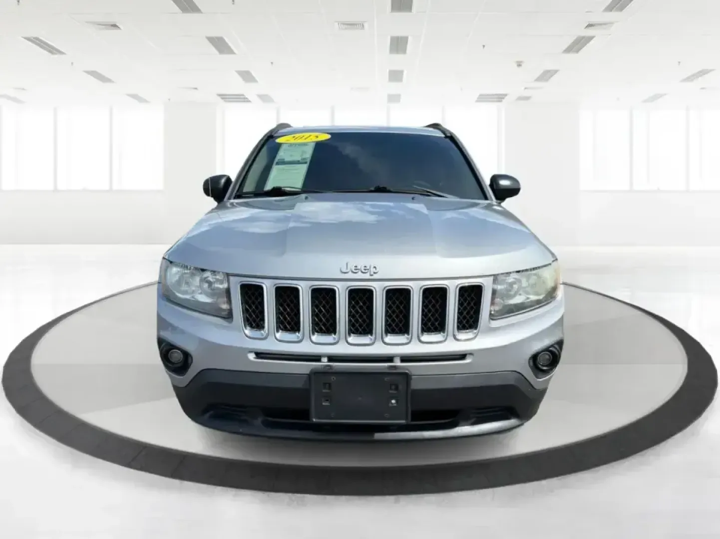 2015 Jeep Compass Sport FWD (1C4NJCBA6FD) with an 2.0L L4 DOHC 16V engine, located at 1951 S Dayton Lakeview Rd., New Carlisle, OH, 45344, (937) 908-9800, 39.890999, -84.050255 - Whether your week looks like a daily commute down I70, school drop-offs around Clark County, or a quick weekend escape to Buck Creek State Park, this **2015 Jeep Compass Sport FWD** is the kind of compact SUV that fits real life. With seating for **five**, easy-to-park sizing, and the versatile carg- Photo#7