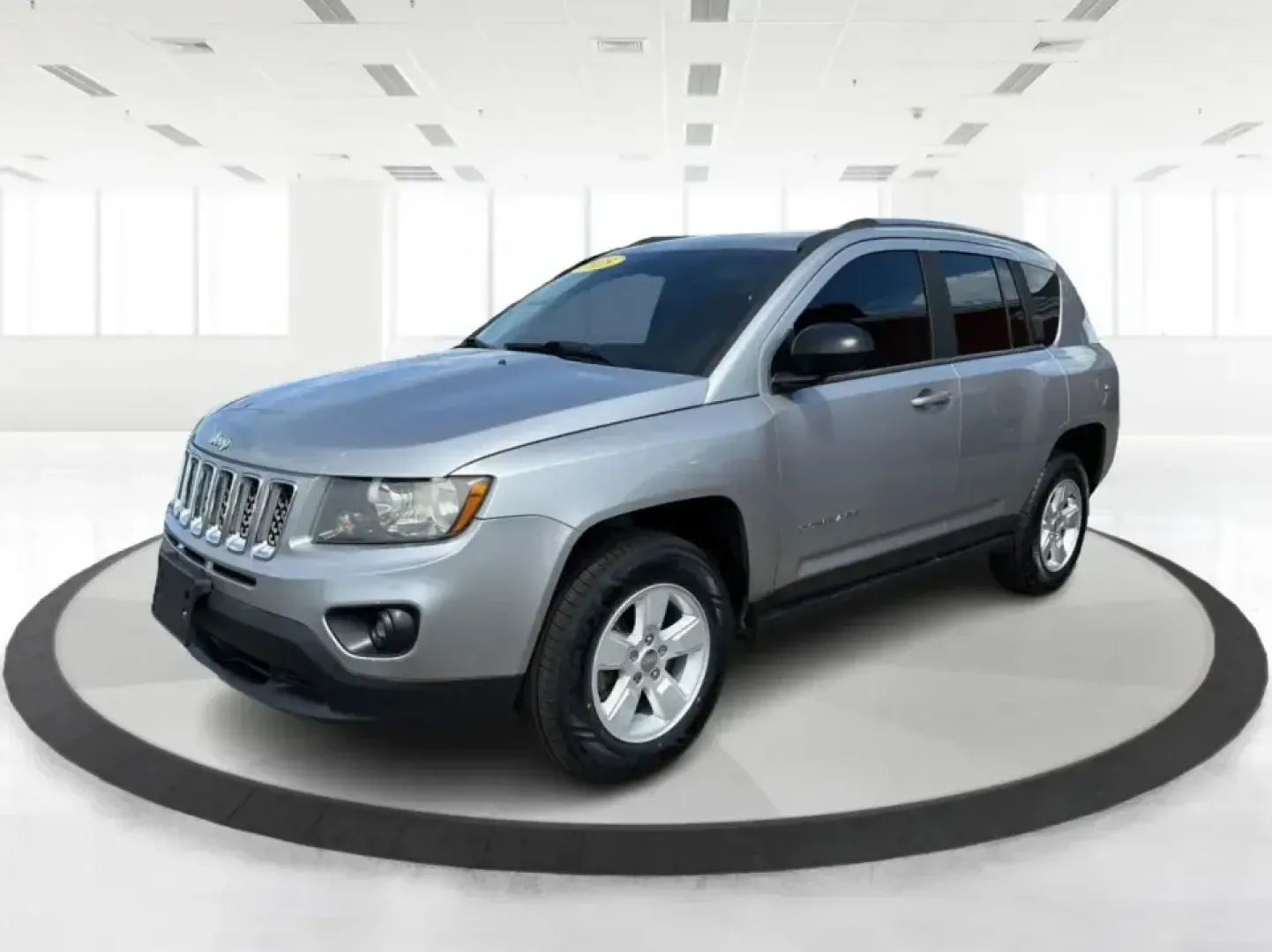 2015 Jeep Compass Sport FWD (1C4NJCBA6FD) with an 2.0L L4 DOHC 16V engine, located at 1951 S Dayton Lakeview Rd., New Carlisle, OH, 45344, (937) 908-9800, 39.890999, -84.050255 - Whether your week looks like a daily commute down I70, school drop-offs around Clark County, or a quick weekend escape to Buck Creek State Park, this **2015 Jeep Compass Sport FWD** is the kind of compact SUV that fits real life. With seating for **five**, easy-to-park sizing, and the versatile carg- Photo#8