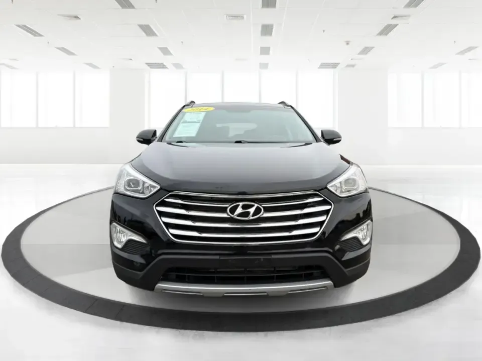 2014 Hyundai Santa Fe Limited AWD (KM8SRDHF4EU) with an 3.3L V6 DOHC 24V engine, 6-Speed Automatic transmission, located at 8750 N County Rd 25A, Piqua, OH, 45356, (937) 908-9800, 40.164391, -84.232513 - Picture your next weekend: loading up the family for a day at John Bryan State Park, heading out for youth sports in Beavercreek, or cruising I35 and US68 for an easy commute to Dayton. This 2014 Hyundai Santa Fe Limited AWD is built for real life in and around Xenia-roomy enough for growing familie - Photo#7