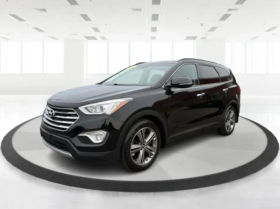 2014 Hyundai Santa Fe Limited AWD (KM8SRDHF4EU) with an 3.3L V6 DOHC 24V engine, 6-Speed Automatic transmission, located at 8750 N County Rd 25A, Piqua, OH, 45356, (937) 908-9800, 40.164391, -84.232513 - Picture your next weekend: loading up the family for a day at John Bryan State Park, heading out for youth sports in Beavercreek, or cruising I35 and US68 for an easy commute to Dayton. This 2014 Hyundai Santa Fe Limited AWD is built for real life in and around Xenia-roomy enough for growing familie - Photo#8