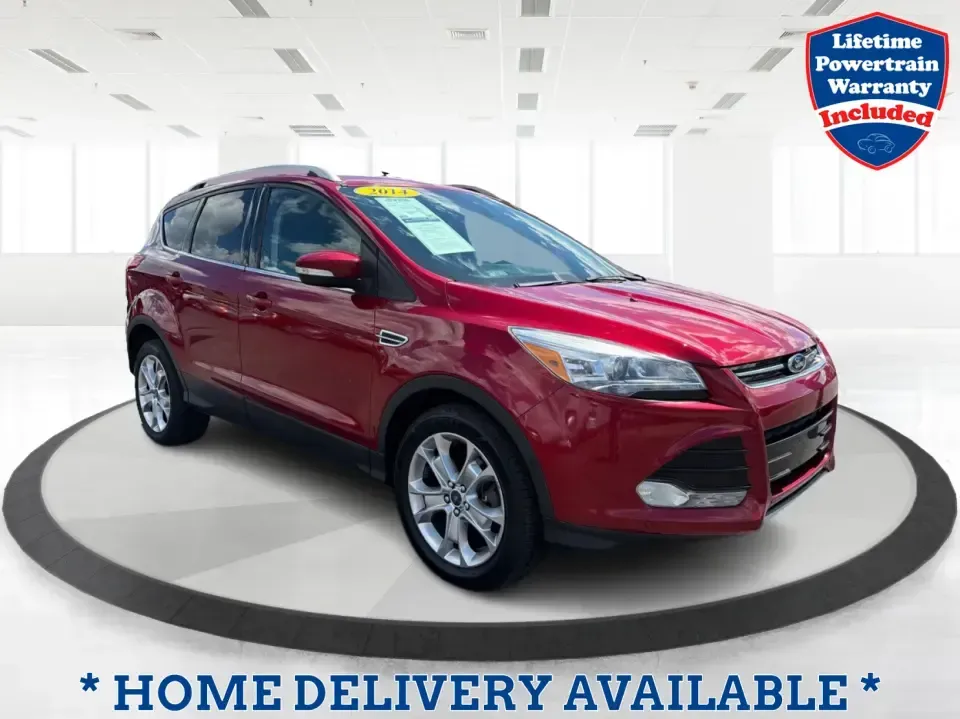 2014 Ford Escape Titanium 4WD (1FMCU9J91EU) with an 2.0L L4 DOHC 16V engine, 6-Speed Automatic transmission, located at 1099 N County Rd 25A, Troy, OH, 45373, (937) 908-9800, 40.057079, -84.212883 - Weekend getaways to Hocking Hills, snowy commutes up I75, or the everyday school-and-grocery loop around Troy-this 2014 Ford Escape Titanium 4WD is built for the kind of life that doesn't slow down when the weather changes. With seating for five, flexible cargo space, and confident four-wheel drive,- Photo#0