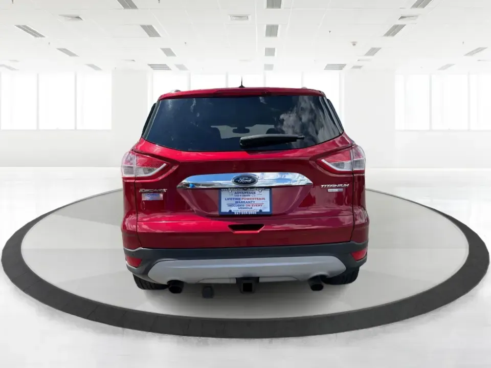 2014 Ford Escape Titanium 4WD (1FMCU9J91EU) with an 2.0L L4 DOHC 16V engine, 6-Speed Automatic transmission, located at 1099 N County Rd 25A, Troy, OH, 45373, (937) 908-9800, 40.057079, -84.212883 - Weekend getaways to Hocking Hills, snowy commutes up I75, or the everyday school-and-grocery loop around Troy-this 2014 Ford Escape Titanium 4WD is built for the kind of life that doesn't slow down when the weather changes. With seating for five, flexible cargo space, and confident four-wheel drive,- Photo#3