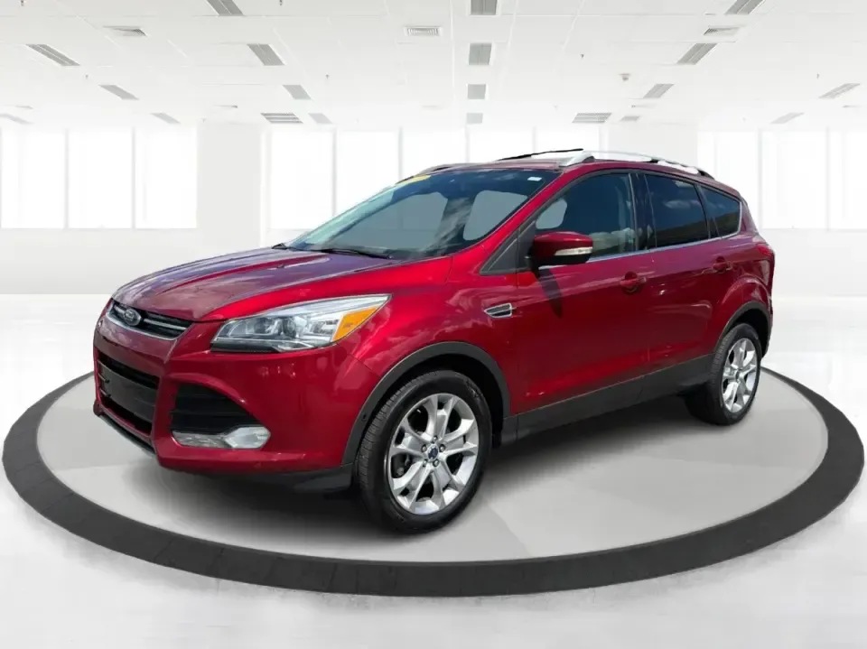 2014 Ford Escape Titanium 4WD (1FMCU9J91EU) with an 2.0L L4 DOHC 16V engine, 6-Speed Automatic transmission, located at 1099 N County Rd 25A, Troy, OH, 45373, (937) 908-9800, 40.057079, -84.212883 - Weekend getaways to Hocking Hills, snowy commutes up I75, or the everyday school-and-grocery loop around Troy-this 2014 Ford Escape Titanium 4WD is built for the kind of life that doesn't slow down when the weather changes. With seating for five, flexible cargo space, and confident four-wheel drive,- Photo#8