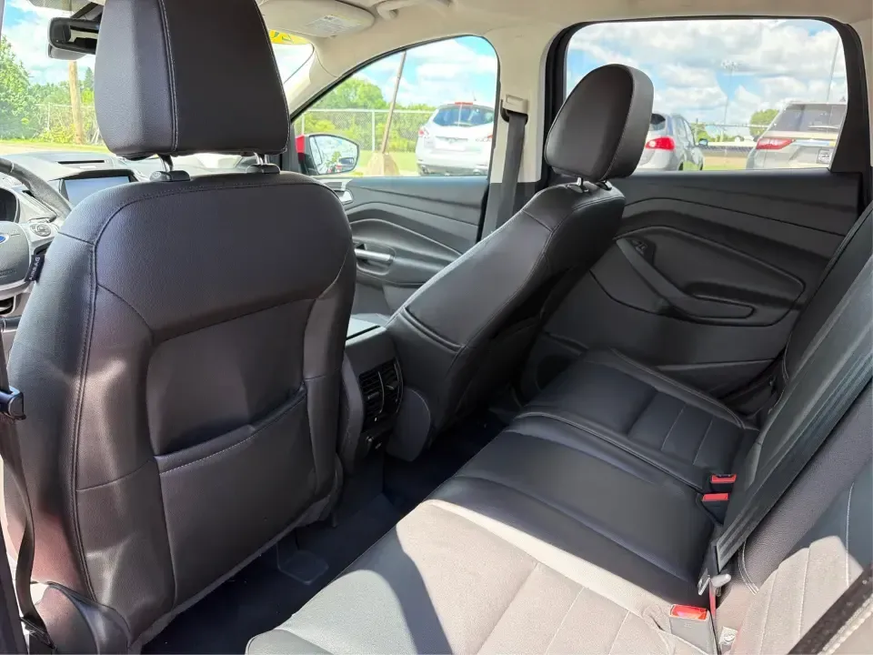 2014 Ford Escape Titanium 4WD (1FMCU9J91EU) with an 2.0L L4 DOHC 16V engine, 6-Speed Automatic transmission, located at 1099 N County Rd 25A, Troy, OH, 45373, (937) 908-9800, 40.057079, -84.212883 - Weekend getaways to Hocking Hills, snowy commutes up I75, or the everyday school-and-grocery loop around Troy-this 2014 Ford Escape Titanium 4WD is built for the kind of life that doesn't slow down when the weather changes. With seating for five, flexible cargo space, and confident four-wheel drive,- Photo#10