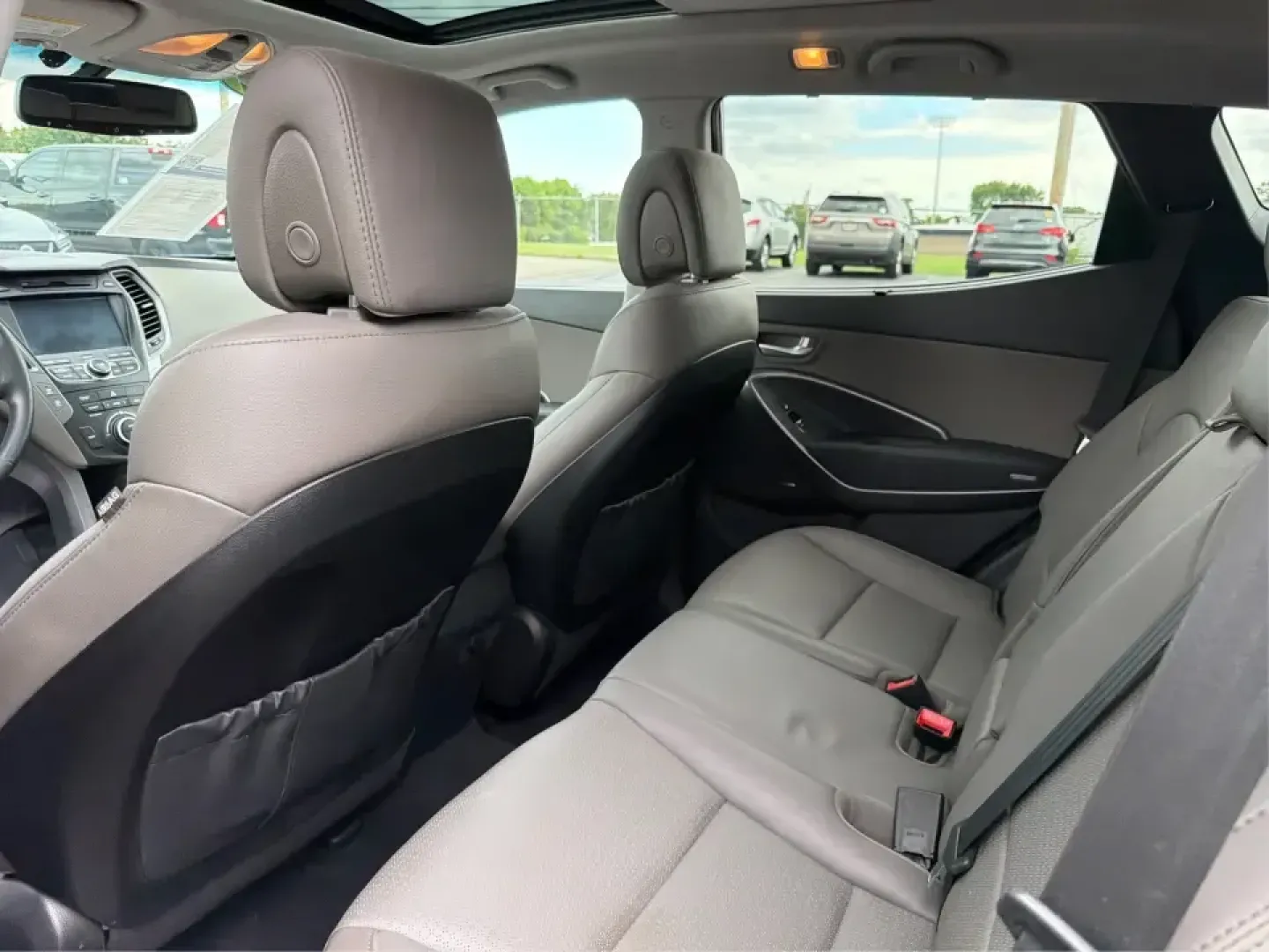 2014 Hyundai Santa Fe Sport 2.4 AWD (5XYZUDLBXEG) with an 2.4L L4 DOHC 16V engine, 6-Speed Automatic transmission, located at 1184 Kauffman Ave, Fairborn, OH, 45324, (937) 908-9800, 39.807072, -84.030914 - If your week looks like school drop-offs, a long commute to Wright-Patterson AFB, and a weekend escape to John Bryan State Park, this SUV fits the rhythm. The 2014 Hyundai Santa Fe Sport 2.4 AWD blends everyday comfort with confident traction, giving Fairborn drivers a practical way to handle Ohio w- Photo#10