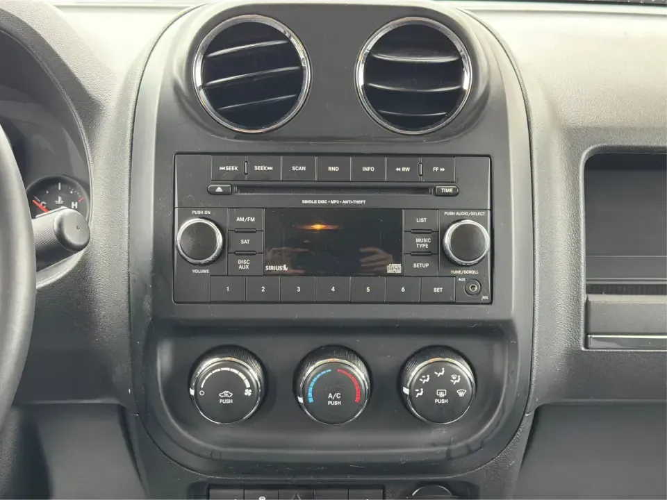 2013 Jeep Patriot Latitude 4WD (1C4NJRFBXDD) with an 2.4L L4 DOHC 16V engine, located at 4508 South Dixie Dr, Moraine, OH, 45439, (937) 908-9800, 39.689976, -84.218452 - Need an SUV that can handle Ohio weather, school drop-offs, and weekend getaways without feeling oversized? This 2013 Jeep Patriot Latitude 4WD is a practical, adventure-ready choice for commuters, growing families, and anyone who wants confident traction for rainy days on South Dixie Drive or snowy- Photo#13