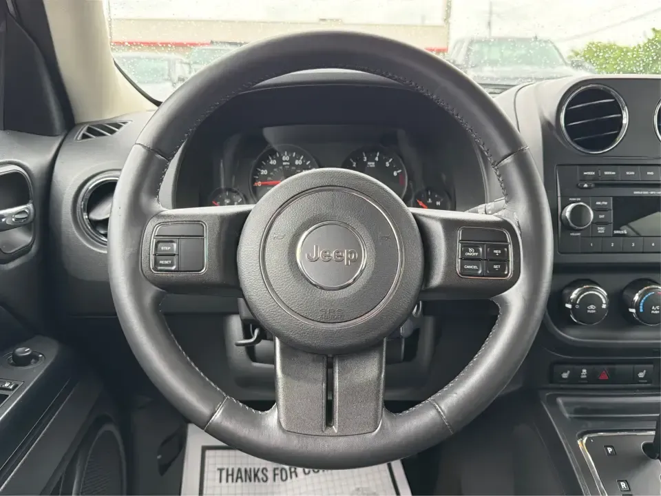 2013 Jeep Patriot Latitude 4WD (1C4NJRFBXDD) with an 2.4L L4 DOHC 16V engine, located at 4508 South Dixie Dr, Moraine, OH, 45439, (937) 908-9800, 39.689976, -84.218452 - Need an SUV that can handle Ohio weather, school drop-offs, and weekend getaways without feeling oversized? This 2013 Jeep Patriot Latitude 4WD is a practical, adventure-ready choice for commuters, growing families, and anyone who wants confident traction for rainy days on South Dixie Drive or snowy- Photo#16