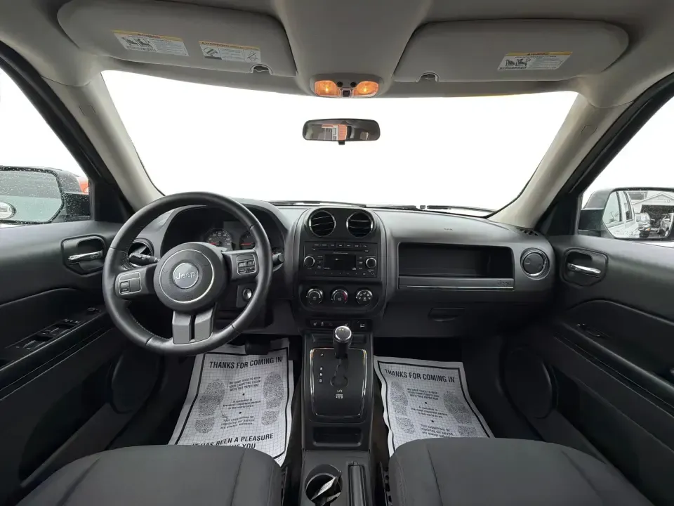 2013 Jeep Patriot Latitude 4WD (1C4NJRFBXDD) with an 2.4L L4 DOHC 16V engine, located at 4508 South Dixie Dr, Moraine, OH, 45439, (937) 908-9800, 39.689976, -84.218452 - Need an SUV that can handle Ohio weather, school drop-offs, and weekend getaways without feeling oversized? This 2013 Jeep Patriot Latitude 4WD is a practical, adventure-ready choice for commuters, growing families, and anyone who wants confident traction for rainy days on South Dixie Drive or snowy- Photo#19