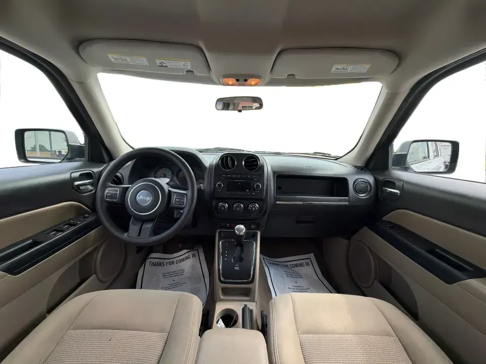 2015 Jeep Patriot Sport 4WD (1C4NJRBB1FD) with an 2.4L L4 DOHC 16V engine, located at 1184 Kauffman Ave, Fairborn, OH, 45324, (937) 908-9800, 39.807072, -84.030914 - Weekend lake days at Huffman Prairie, snowy commutes to Wright-Patterson AFB, or a packed-backseat run to The Greene-this 2015 Jeep Patriot Sport 4WD is built for Fairborn life when you want SUV versatility without giving up everyday practicality. With confident four-wheel drive and a manageable siz- Photo#19