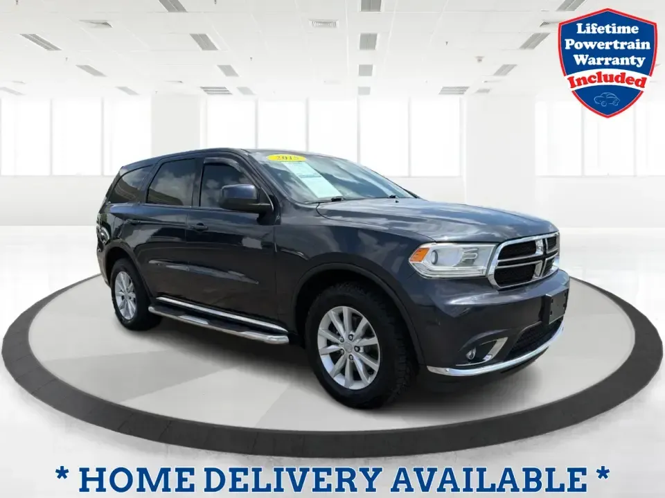 2015 Dodge Durango SXT AWD (1C4RDJAGXFC) with an 3.6L V6 DOHC 24V engine, 8-Speed Automatic transmission, located at 8750 N County Rd 25A, Piqua, OH, 45356, (937) 908-9800, 40.164391, -84.232513 - Need one SUV that can handle the school run, a long I75 commute, and a packed weekend at Indian Lake without feeling cramped? This 2015 Dodge Durango SXT AWD is built for real life in West Central Ohio-roomy for up to seven passengers, confident in changing weather, and versatile enough for everythi- Photo#0