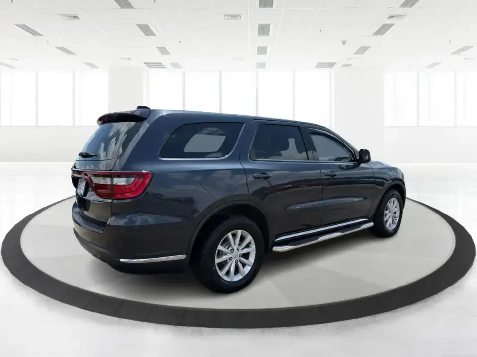 2015 Dodge Durango SXT AWD (1C4RDJAGXFC) with an 3.6L V6 DOHC 24V engine, 8-Speed Automatic transmission, located at 8750 N County Rd 25A, Piqua, OH, 45356, (937) 908-9800, 40.164391, -84.232513 - Need one SUV that can handle the school run, a long I75 commute, and a packed weekend at Indian Lake without feeling cramped? This 2015 Dodge Durango SXT AWD is built for real life in West Central Ohio-roomy for up to seven passengers, confident in changing weather, and versatile enough for everythi- Photo#2