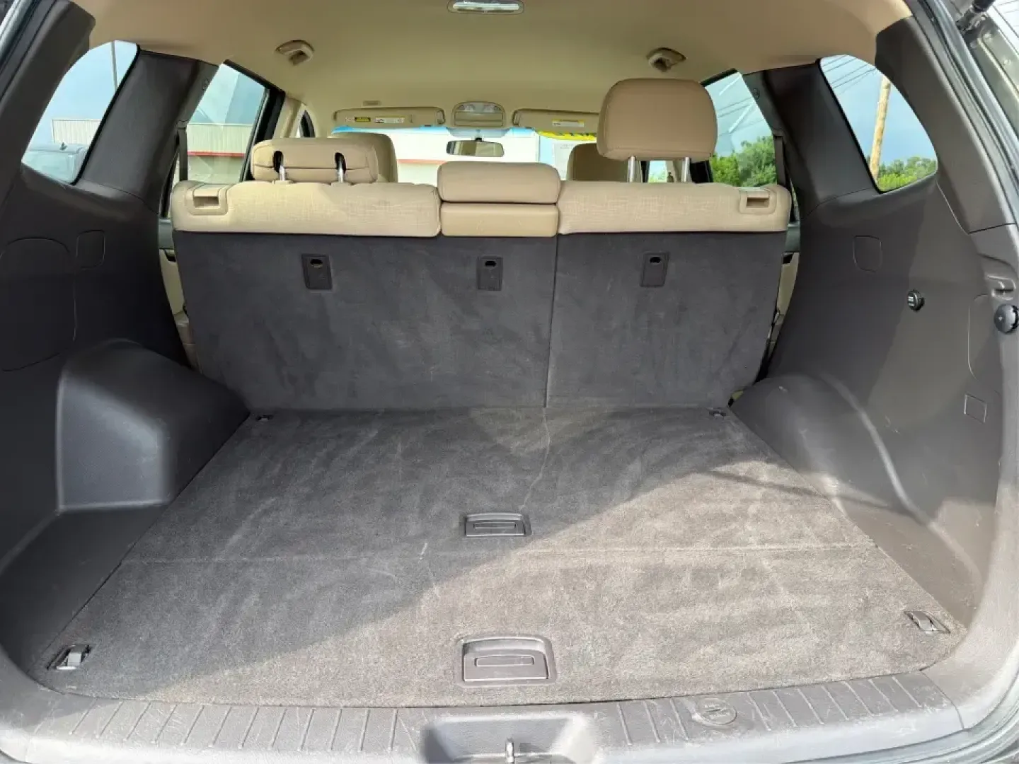 2012 Hyundai Santa Fe GLS 2.4 FWD (5XYZG3AB8CG) with an 2.4L L4 DOHC 16V engine, 6-Speed Automatic transmission, located at 8750 N County Rd 25A, Piqua, OH, 45356, (937) 908-9800, 40.164391, -84.232513 - Picture an easy weekend getaway: you load the cooler, fold the second-row seats for extra gear, and head out of Piqua toward Indian Lake or a day trip through the Miami Valley-without needing a giant SUV. This 2012 Hyundai Santa Fe GLS 2.4 is a practical, five-passenger SUV that fits real life, whet- Photo#12