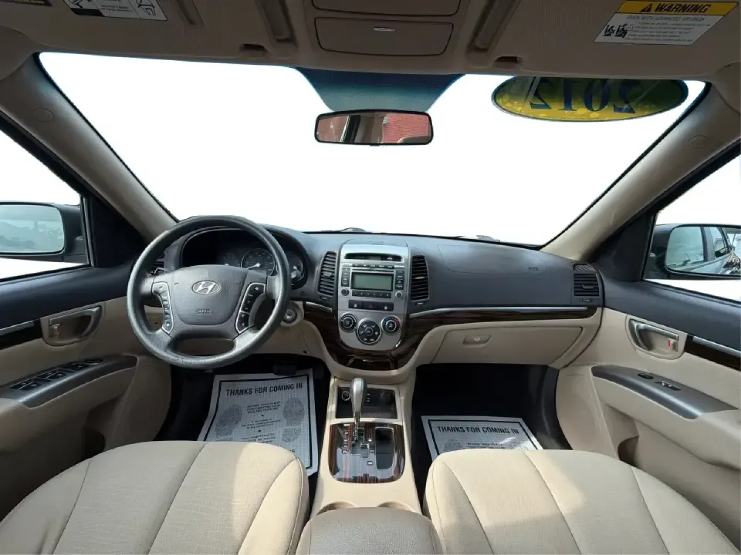 2012 Hyundai Santa Fe GLS 2.4 FWD (5XYZG3AB8CG) with an 2.4L L4 DOHC 16V engine, 6-Speed Automatic transmission, located at 8750 N County Rd 25A, Piqua, OH, 45356, (937) 908-9800, 40.164391, -84.232513 - Picture an easy weekend getaway: you load the cooler, fold the second-row seats for extra gear, and head out of Piqua toward Indian Lake or a day trip through the Miami Valley-without needing a giant SUV. This 2012 Hyundai Santa Fe GLS 2.4 is a practical, five-passenger SUV that fits real life, whet- Photo#20