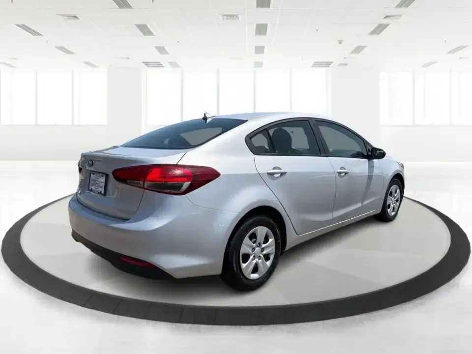2018 Kia Forte LX (3KPFK4A73JE) with an 2.0L L4 DOHC 16V engine, 6M transmission, located at 401 Woodman Dr, Riverside, OH, 45431, (937) 908-9800, 39.760899, -84.123421 - Need a dependable commuter that can handle the daily grind from Riverside to Wright-Patterson AFB, downtown Dayton, or a quick hop up I-675-without sacrificing comfort for your weekend plans? This 2018 Kia Forte LX 6M is a smart, budget-friendly sedan built for real life: efficient errands around Wo- Photo#2