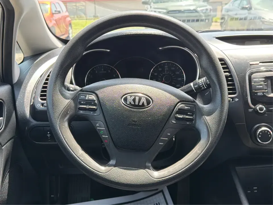 2018 Kia Forte LX (3KPFK4A73JE) with an 2.0L L4 DOHC 16V engine, 6M transmission, located at 401 Woodman Dr, Riverside, OH, 45431, (937) 908-9800, 39.760899, -84.123421 - Need a dependable commuter that can handle the daily grind from Riverside to Wright-Patterson AFB, downtown Dayton, or a quick hop up I-675-without sacrificing comfort for your weekend plans? This 2018 Kia Forte LX 6M is a smart, budget-friendly sedan built for real life: efficient errands around Wo- Photo#16