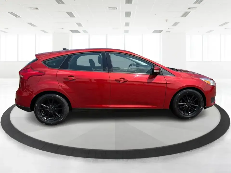 2018 Ford Focus SE (1FADP3K27JL) with an 2L I-4 gasoline direct injection engine, Automatic transmission, located at 401 Woodman Dr, Riverside, OH, 45431, (937) 908-9800, 39.760899, -84.123421 - Need a smart, efficient ride for the daily commute, campus runs, or quick weekend getaways around the Miami Valley? This 2018 Ford Focus SE in eye-catching Hot Pepper Red Metallic Tinted Clearcoat is a practical hatchback-style choice that fits real life-easy to park in busy lots, comfortable for fi- Photo#1