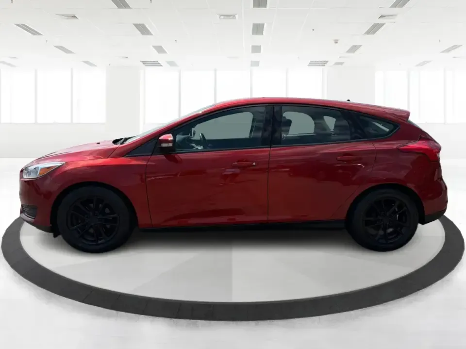 2018 Ford Focus SE (1FADP3K27JL) with an 2L I-4 gasoline direct injection engine, Automatic transmission, located at 401 Woodman Dr, Riverside, OH, 45431, (937) 908-9800, 39.760899, -84.123421 - Need a smart, efficient ride for the daily commute, campus runs, or quick weekend getaways around the Miami Valley? This 2018 Ford Focus SE in eye-catching Hot Pepper Red Metallic Tinted Clearcoat is a practical hatchback-style choice that fits real life-easy to park in busy lots, comfortable for fi- Photo#5