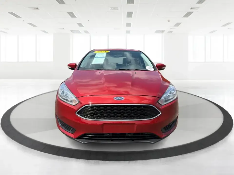 2018 Ford Focus SE (1FADP3K27JL) with an 2L I-4 gasoline direct injection engine, Automatic transmission, located at 401 Woodman Dr, Riverside, OH, 45431, (937) 908-9800, 39.760899, -84.123421 - Need a smart, efficient ride for the daily commute, campus runs, or quick weekend getaways around the Miami Valley? This 2018 Ford Focus SE in eye-catching Hot Pepper Red Metallic Tinted Clearcoat is a practical hatchback-style choice that fits real life-easy to park in busy lots, comfortable for fi- Photo#7