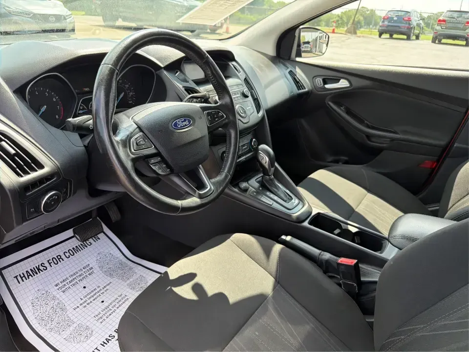 2018 Ford Focus SE (1FADP3K27JL) with an 2L I-4 gasoline direct injection engine, Automatic transmission, located at 401 Woodman Dr, Riverside, OH, 45431, (937) 908-9800, 39.760899, -84.123421 - Need a smart, efficient ride for the daily commute, campus runs, or quick weekend getaways around the Miami Valley? This 2018 Ford Focus SE in eye-catching Hot Pepper Red Metallic Tinted Clearcoat is a practical hatchback-style choice that fits real life-easy to park in busy lots, comfortable for fi- Photo#9
