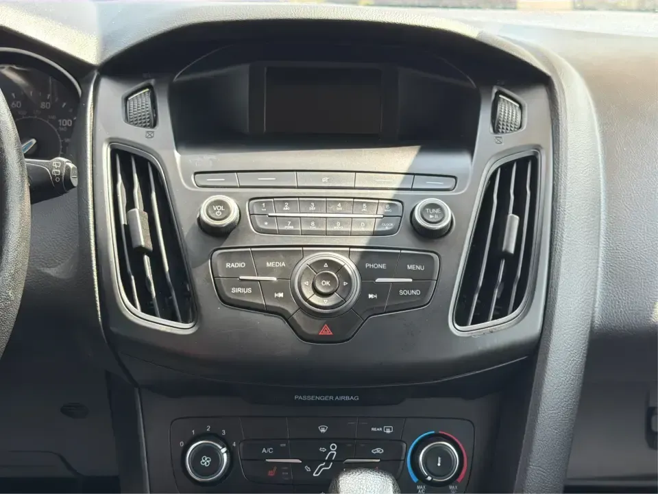 2018 Ford Focus SE (1FADP3K27JL) with an 2L I-4 gasoline direct injection engine, Automatic transmission, located at 401 Woodman Dr, Riverside, OH, 45431, (937) 908-9800, 39.760899, -84.123421 - Need a smart, efficient ride for the daily commute, campus runs, or quick weekend getaways around the Miami Valley? This 2018 Ford Focus SE in eye-catching Hot Pepper Red Metallic Tinted Clearcoat is a practical hatchback-style choice that fits real life-easy to park in busy lots, comfortable for fi- Photo#13