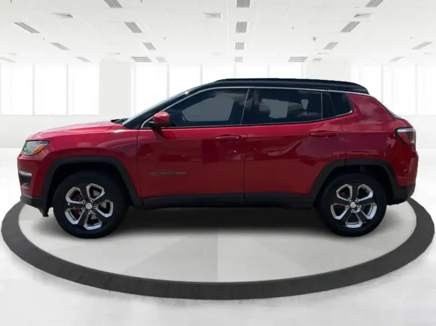 2019 Jeep Compass Longitude, North, Latitude (3C4NJCBB1KT) with an 2.4L I-4 variable valve control engine, located at 4508 South Dixie Dr, Moraine, OH, 45439, (937) 908-9800, 39.689976, -84.218452 - Picture your next weekend: loading up the family for a day at Carillon Historical Park, cruising down South Dixie Drive for errands, then heading out on I-75 for a quick getaway-without needing a huge SUV. This 2019 Jeep Compass in striking Redline Pearlcoat is a smart, city-friendly SUV that still- Photo#5