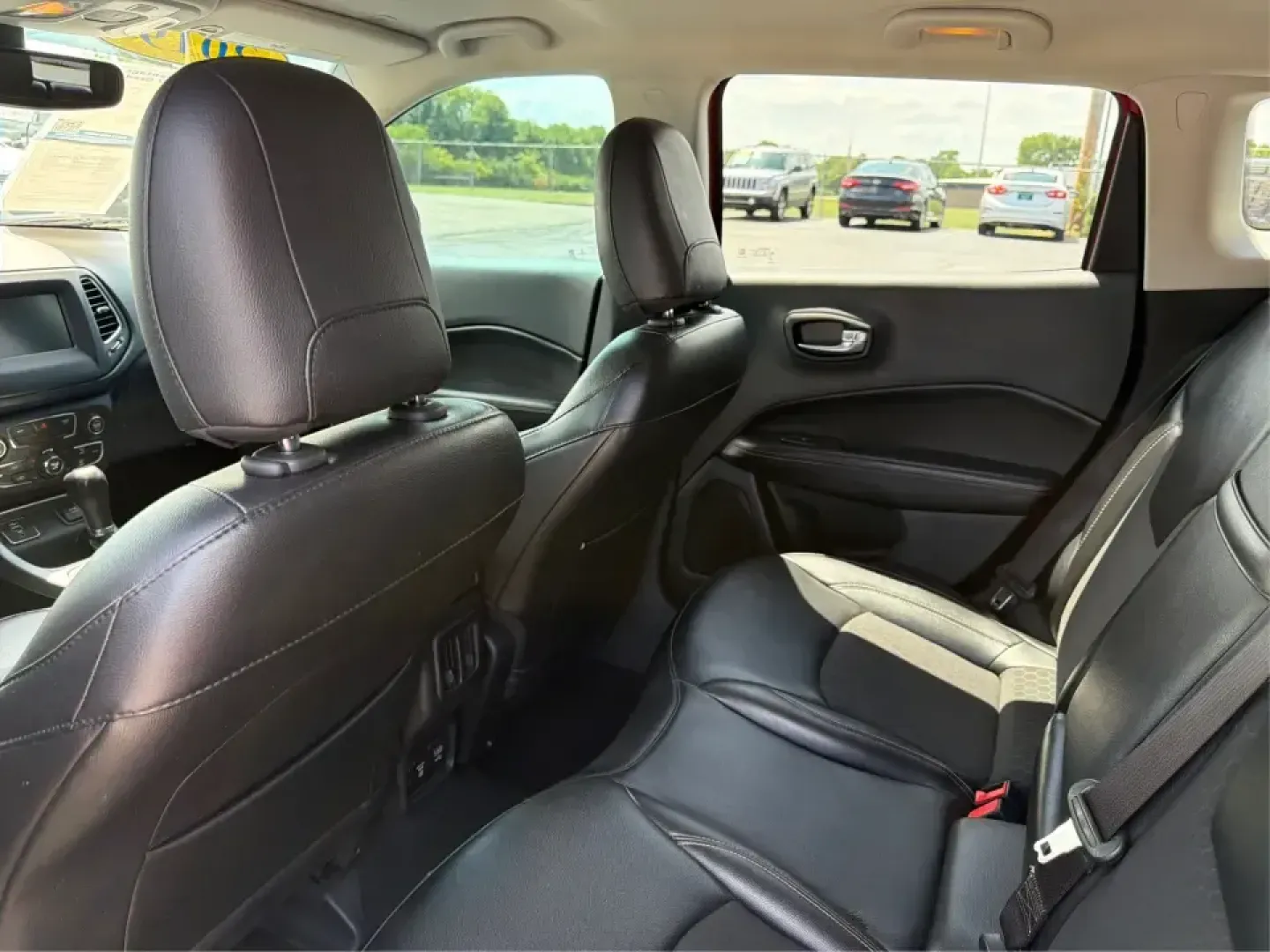 2019 Jeep Compass Longitude, North, Latitude (3C4NJCBB1KT) with an 2.4L I-4 variable valve control engine, located at 4508 South Dixie Dr, Moraine, OH, 45439, (937) 908-9800, 39.689976, -84.218452 - Picture your next weekend: loading up the family for a day at Carillon Historical Park, cruising down South Dixie Drive for errands, then heading out on I-75 for a quick getaway-without needing a huge SUV. This 2019 Jeep Compass in striking Redline Pearlcoat is a smart, city-friendly SUV that still- Photo#10
