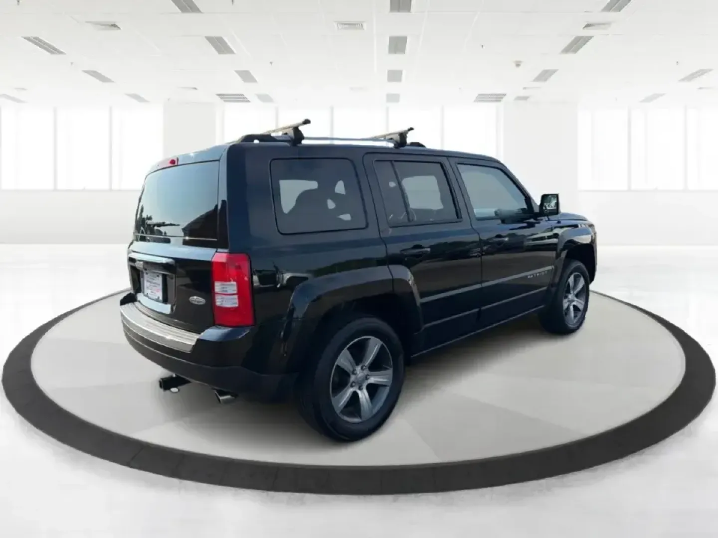 2016 Jeep Patriot Latitude (1C4NJRFB6GD) with an 2.4L I-4 DOHC engine, located at 1230 East Main St, Xenia, OH, 45385, (937) 908-9800, 39.688026, -83.910172 - Weekday commute on US-35, grocery runs through downtown Xenia, and spontaneous weekend escapes to John Bryan State Park or the bike trails near Yellow Springs-this 2016 Jeep Patriot Latitude is built for the kind of life that doesn't stay parked. With SUV versatility, confident 4WD/AWD capability, a- Photo#2