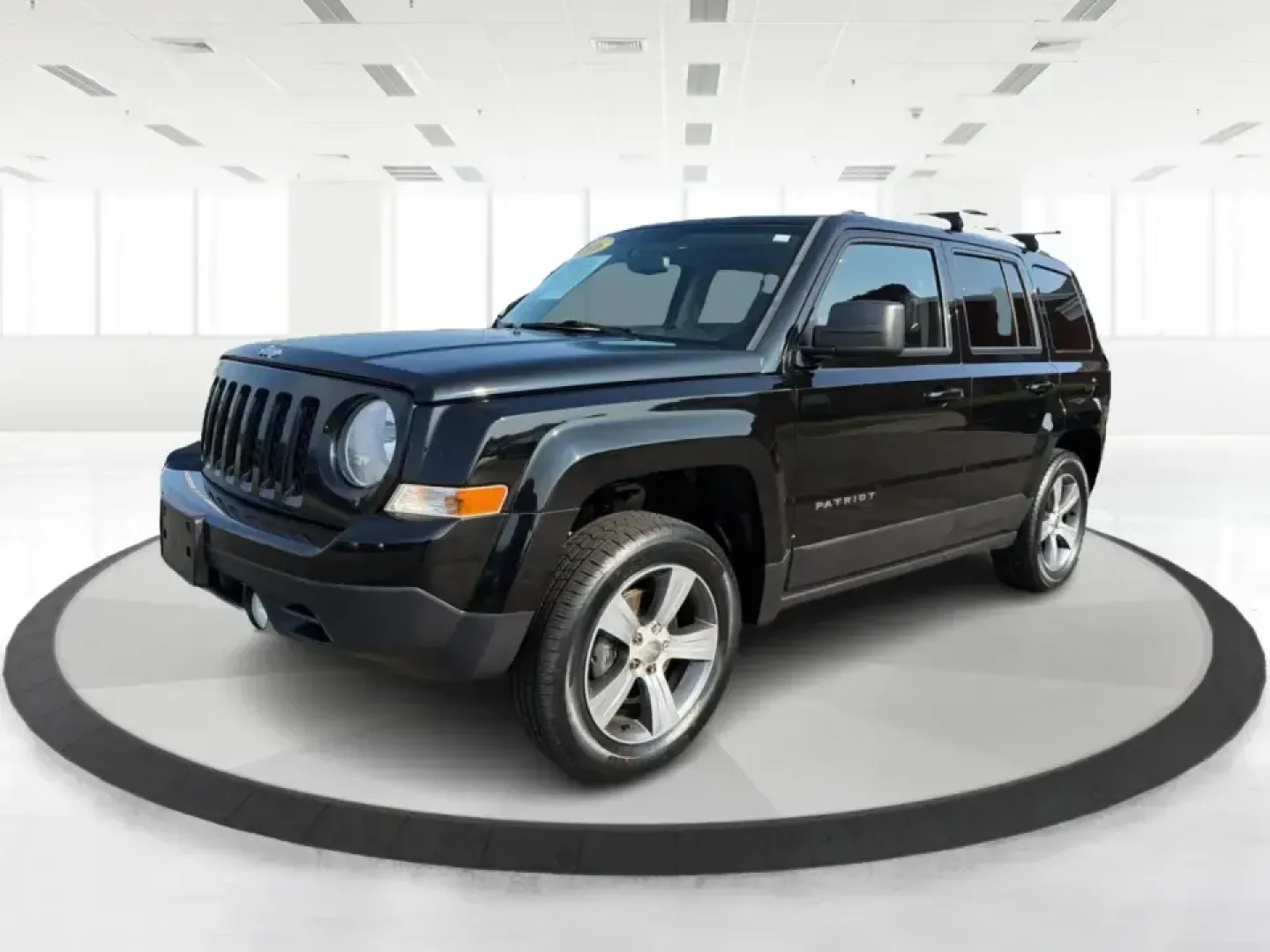 2016 Jeep Patriot Latitude (1C4NJRFB6GD) with an 2.4L I-4 DOHC engine, located at 1230 East Main St, Xenia, OH, 45385, (937) 908-9800, 39.688026, -83.910172 - Weekday commute on US-35, grocery runs through downtown Xenia, and spontaneous weekend escapes to John Bryan State Park or the bike trails near Yellow Springs-this 2016 Jeep Patriot Latitude is built for the kind of life that doesn't stay parked. With SUV versatility, confident 4WD/AWD capability, a- Photo#8