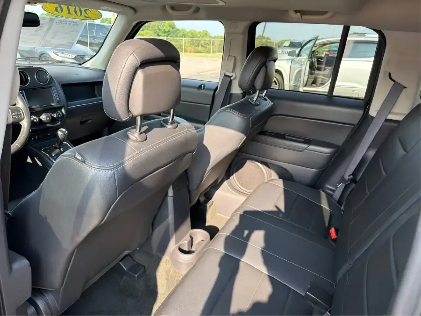 2016 Jeep Patriot Latitude (1C4NJRFB6GD) with an 2.4L I-4 DOHC engine, located at 1230 East Main St, Xenia, OH, 45385, (937) 908-9800, 39.688026, -83.910172 - Weekday commute on US-35, grocery runs through downtown Xenia, and spontaneous weekend escapes to John Bryan State Park or the bike trails near Yellow Springs-this 2016 Jeep Patriot Latitude is built for the kind of life that doesn't stay parked. With SUV versatility, confident 4WD/AWD capability, a- Photo#10