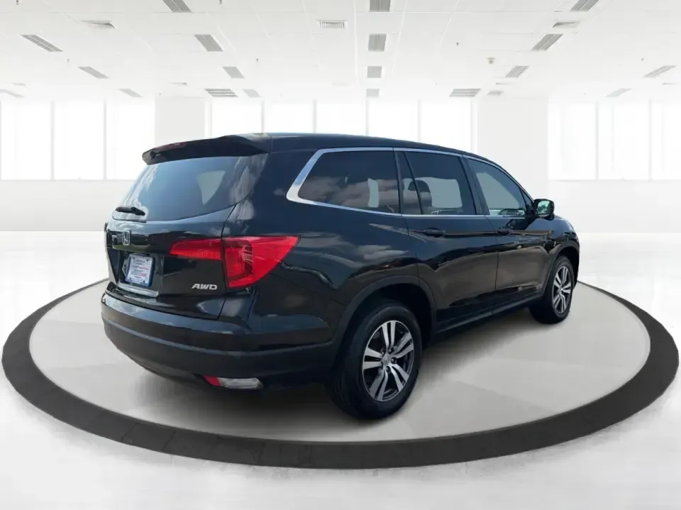 2016 Honda Pilot EXL 4WD (5FNYF6H63GB) with an 3.5L V6 SOHC 24V engine, 6-Speed Automatic transmission, located at 8750 N County Rd 25A, Piqua, OH, 45356, (937) 908-9800, 40.164391, -84.232513 - Need one SUV that can handle the school run, the long commute up I75, and a loaded-up weekend at Indian Lake? This 2016 Honda Pilot EXL 4WD is built for real life in West Central Ohio-room for up to 8 passengers, confident all-weather traction, and the comfort features that make everyday driving fee- Photo#2