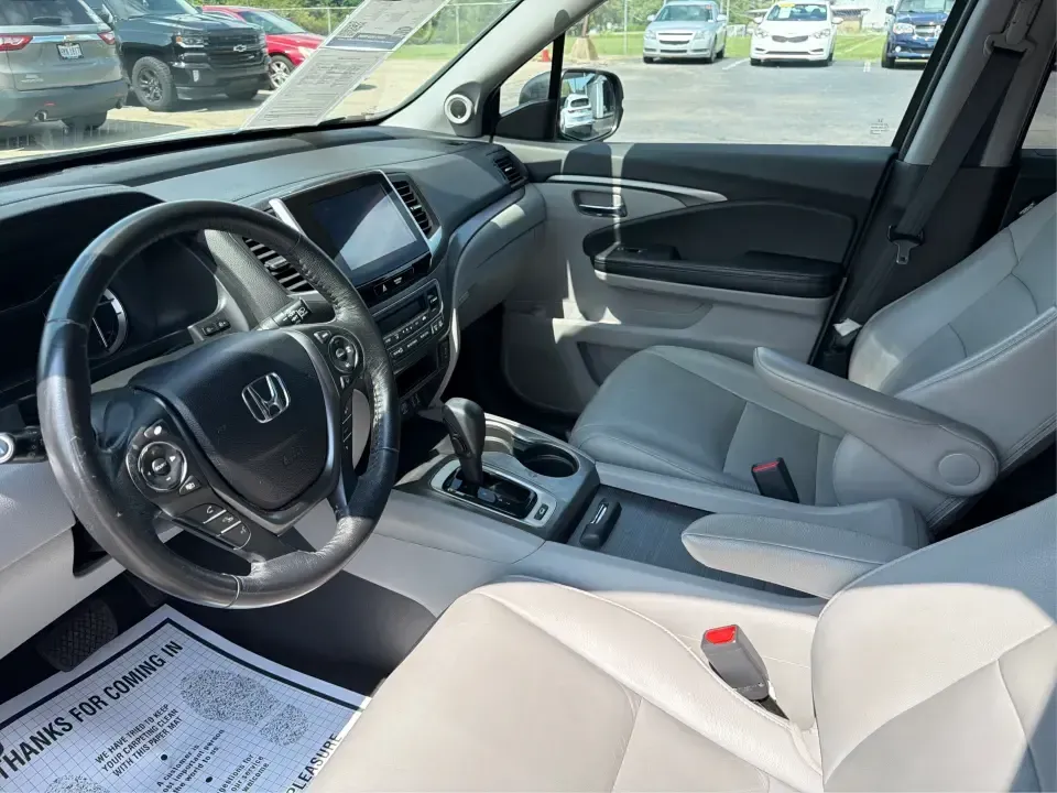 2016 Honda Pilot EXL 4WD (5FNYF6H63GB) with an 3.5L V6 SOHC 24V engine, 6-Speed Automatic transmission, located at 8750 N County Rd 25A, Piqua, OH, 45356, (937) 908-9800, 40.164391, -84.232513 - Need one SUV that can handle the school run, the long commute up I75, and a loaded-up weekend at Indian Lake? This 2016 Honda Pilot EXL 4WD is built for real life in West Central Ohio-room for up to 8 passengers, confident all-weather traction, and the comfort features that make everyday driving fee- Photo#9