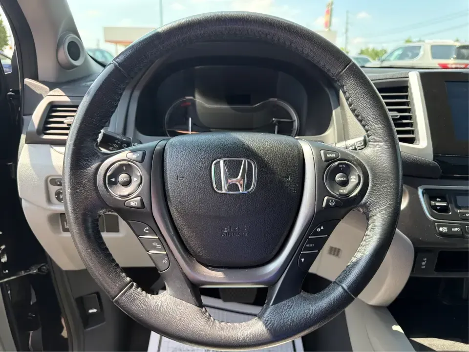 2016 Honda Pilot EXL 4WD (5FNYF6H63GB) with an 3.5L V6 SOHC 24V engine, 6-Speed Automatic transmission, located at 8750 N County Rd 25A, Piqua, OH, 45356, (937) 908-9800, 40.164391, -84.232513 - Need one SUV that can handle the school run, the long commute up I75, and a loaded-up weekend at Indian Lake? This 2016 Honda Pilot EXL 4WD is built for real life in West Central Ohio-room for up to 8 passengers, confident all-weather traction, and the comfort features that make everyday driving fee- Photo#15