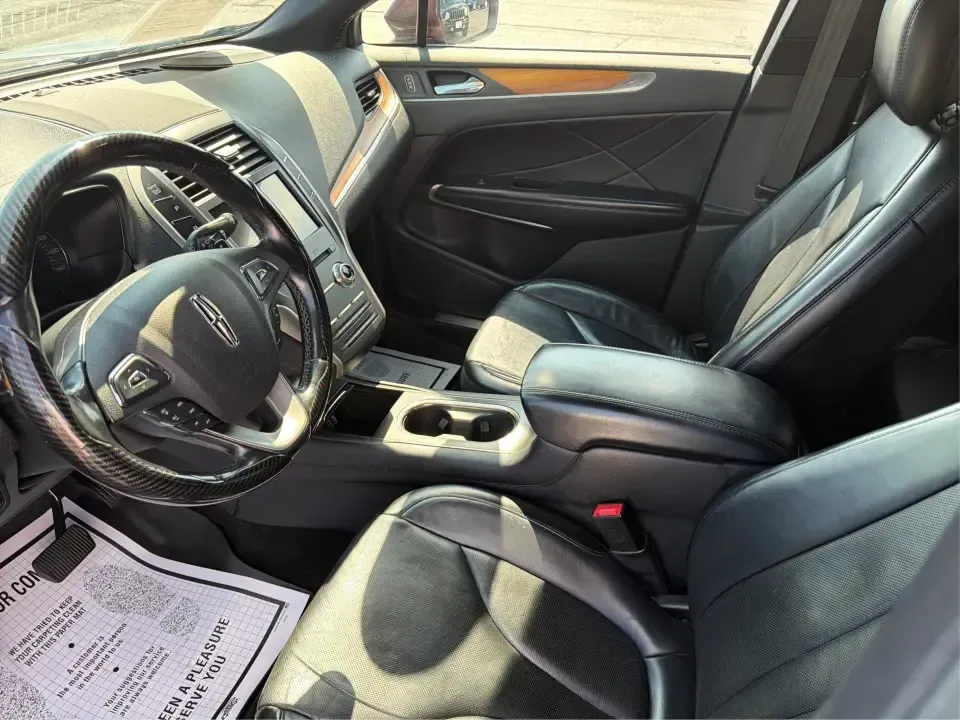 2017 Lincoln MKC Reserve AWD (5LMTJ3DH5HU) with an 2.3L L4 DOHC 16V engine, 6-Speed Automatic transmission, located at 8750 N County Rd 25A, Piqua, OH, 45356, (937) 908-9800, 40.164391, -84.232513 - Need a comfortable, upscale SUV that can handle Ohio weather, school drop-offs, and weekend getaways without feeling like a chore? This 2017 Lincoln MKC Reserve AWD in Ruby Red Metallic Tinted Clearcoat is a smart fit for commuters, growing families, and anyone who wants premium features for daily l- Photo#9