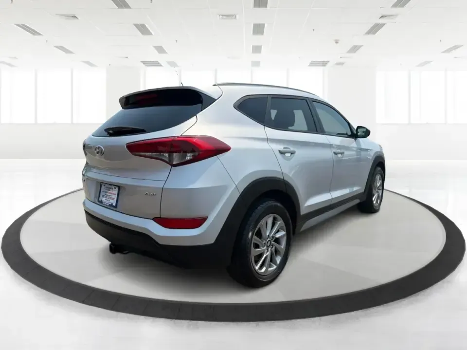 2017 Hyundai Tucson SE w/Preferred Package AWD (KM8J3CA41HU) with an 2.0L L4 DOHC 16V engine, 6-Speed Automatic transmission, located at 4508 South Dixie Dr, Moraine, OH, 45439, (937) 908-9800, 39.689976, -84.218452 - Pack up the kids for a day at Carillon Historical Park, load camping gear for a weekend at Caesar Creek, or tackle a snowy I75 commute with confidence-this **2017 Hyundai Tucson SE w/Preferred Package AWD** is the kind of SUV that fits real life in the Miami Valley. With its versatile cargo space, a- Photo#2
