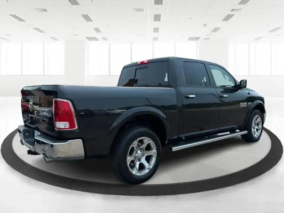 2015 Ram 1500 Laramie Crew Cab SWB 4WD (1C6RR7NT8FS) with an 5.7L V8 OHV 16V engine, 6-Speed Automatic transmission, located at 880 E. National Road, Vandalia, OH, 45377, (937) 908-9800, 39.891918, -84.183594 - Ready for a truck that can handle weekday work, weekend lake runs, and winter weather on the way up I75? This 2015 Ram 1500 Laramie Crew Cab SWB 4WD brings V8 strength, upscale comfort, and four-door practicality-ideal for commuters heading toward Dayton, families with busy schedules, and outdoor en- Photo#2