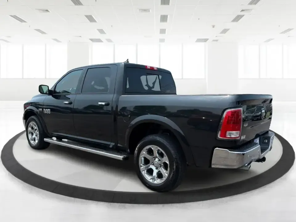 2015 Ram 1500 Laramie Crew Cab SWB 4WD (1C6RR7NT8FS) with an 5.7L V8 OHV 16V engine, 6-Speed Automatic transmission, located at 880 E. National Road, Vandalia, OH, 45377, (937) 908-9800, 39.891918, -84.183594 - Ready for a truck that can handle weekday work, weekend lake runs, and winter weather on the way up I75? This 2015 Ram 1500 Laramie Crew Cab SWB 4WD brings V8 strength, upscale comfort, and four-door practicality-ideal for commuters heading toward Dayton, families with busy schedules, and outdoor en- Photo#4
