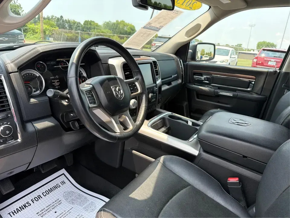 2015 Ram 1500 Laramie Crew Cab SWB 4WD (1C6RR7NT8FS) with an 5.7L V8 OHV 16V engine, 6-Speed Automatic transmission, located at 880 E. National Road, Vandalia, OH, 45377, (937) 908-9800, 39.891918, -84.183594 - Ready for a truck that can handle weekday work, weekend lake runs, and winter weather on the way up I75? This 2015 Ram 1500 Laramie Crew Cab SWB 4WD brings V8 strength, upscale comfort, and four-door practicality-ideal for commuters heading toward Dayton, families with busy schedules, and outdoor en- Photo#9