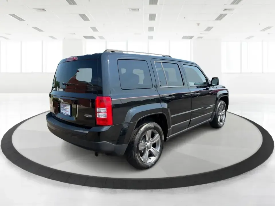 2014 Jeep Patriot Latitude 2WD (1C4NJPFA2ED) with an 2.0L L4 DOHC 16V engine, located at 8750 N County Rd 25A, Piqua, OH, 45356, (937) 908-9800, 40.164391, -84.232513 - Need a practical SUV for school runs, daily commutes to Troy or Dayton, and spontaneous weekend getaways without stretching the budget? This **2014 Jeep Patriot Latitude 2WD** is a smart, flexible choice for drivers who want SUV space, easy-to-live-with comfort, and a straightforward ownership exper- Photo#2