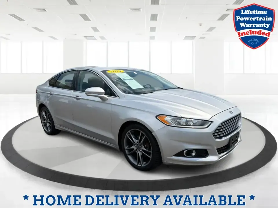 2014 Ford Fusion Titanium AWD (3FA6P0D98ER) with an 2.0L L4 DOHC 16V engine, located at 1099 N County Rd 25A, Troy, OH, 45373, (937) 908-9800, 40.057079, -84.212883 - Need a smart, comfortable sedan that can handle Ohio's changing weather for daily commuting, school drop-offs, and weekend getaways? This 2014 Ford Fusion Titanium AWD is built for real life in and around Troy-whether you're cruising down I75 to Dayton, heading across town on N County Rd 25A, or pla- Photo#0