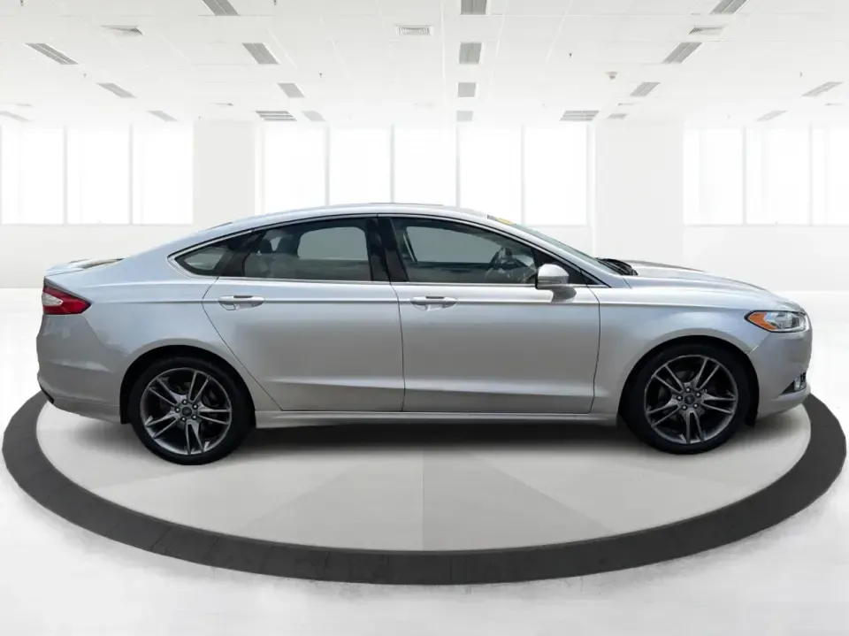 2014 Ford Fusion Titanium AWD (3FA6P0D98ER) with an 2.0L L4 DOHC 16V engine, located at 1099 N County Rd 25A, Troy, OH, 45373, (937) 908-9800, 40.057079, -84.212883 - Need a smart, comfortable sedan that can handle Ohio's changing weather for daily commuting, school drop-offs, and weekend getaways? This 2014 Ford Fusion Titanium AWD is built for real life in and around Troy-whether you're cruising down I75 to Dayton, heading across town on N County Rd 25A, or pla- Photo#1