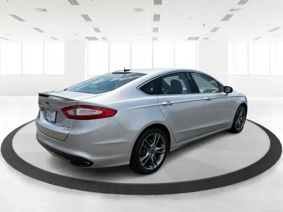 2014 Ford Fusion Titanium AWD (3FA6P0D98ER) with an 2.0L L4 DOHC 16V engine, located at 1099 N County Rd 25A, Troy, OH, 45373, (937) 908-9800, 40.057079, -84.212883 - Need a smart, comfortable sedan that can handle Ohio's changing weather for daily commuting, school drop-offs, and weekend getaways? This 2014 Ford Fusion Titanium AWD is built for real life in and around Troy-whether you're cruising down I75 to Dayton, heading across town on N County Rd 25A, or pla- Photo#2