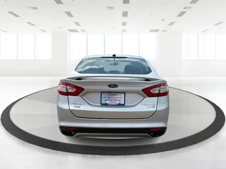 2014 Ford Fusion Titanium AWD (3FA6P0D98ER) with an 2.0L L4 DOHC 16V engine, located at 1099 N County Rd 25A, Troy, OH, 45373, (937) 908-9800, 40.057079, -84.212883 - Need a smart, comfortable sedan that can handle Ohio's changing weather for daily commuting, school drop-offs, and weekend getaways? This 2014 Ford Fusion Titanium AWD is built for real life in and around Troy-whether you're cruising down I75 to Dayton, heading across town on N County Rd 25A, or pla- Photo#3