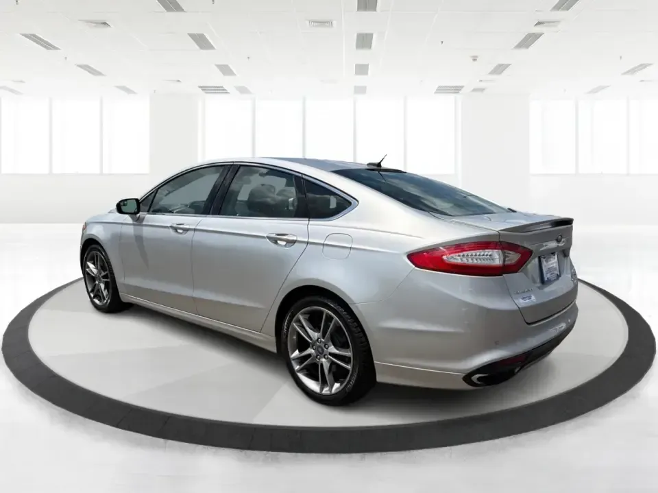 2014 Ford Fusion Titanium AWD (3FA6P0D98ER) with an 2.0L L4 DOHC 16V engine, located at 1099 N County Rd 25A, Troy, OH, 45373, (937) 908-9800, 40.057079, -84.212883 - Need a smart, comfortable sedan that can handle Ohio's changing weather for daily commuting, school drop-offs, and weekend getaways? This 2014 Ford Fusion Titanium AWD is built for real life in and around Troy-whether you're cruising down I75 to Dayton, heading across town on N County Rd 25A, or pla- Photo#4