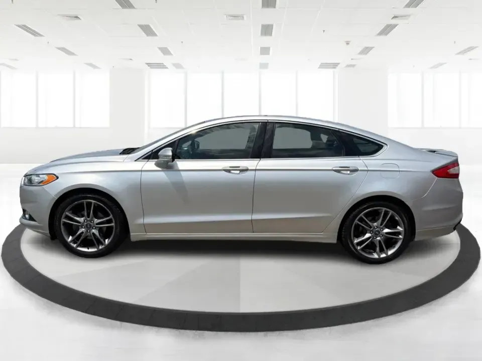 2014 Ford Fusion Titanium AWD (3FA6P0D98ER) with an 2.0L L4 DOHC 16V engine, located at 1099 N County Rd 25A, Troy, OH, 45373, (937) 908-9800, 40.057079, -84.212883 - Need a smart, comfortable sedan that can handle Ohio's changing weather for daily commuting, school drop-offs, and weekend getaways? This 2014 Ford Fusion Titanium AWD is built for real life in and around Troy-whether you're cruising down I75 to Dayton, heading across town on N County Rd 25A, or pla- Photo#5