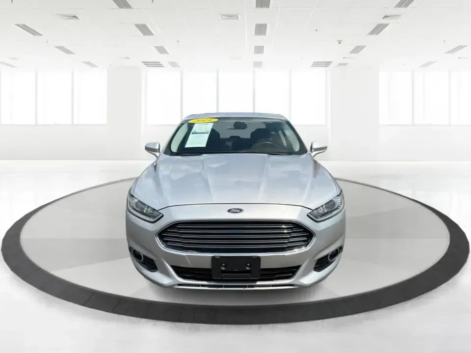 2014 Ford Fusion Titanium AWD (3FA6P0D98ER) with an 2.0L L4 DOHC 16V engine, located at 1099 N County Rd 25A, Troy, OH, 45373, (937) 908-9800, 40.057079, -84.212883 - Need a smart, comfortable sedan that can handle Ohio's changing weather for daily commuting, school drop-offs, and weekend getaways? This 2014 Ford Fusion Titanium AWD is built for real life in and around Troy-whether you're cruising down I75 to Dayton, heading across town on N County Rd 25A, or pla- Photo#7